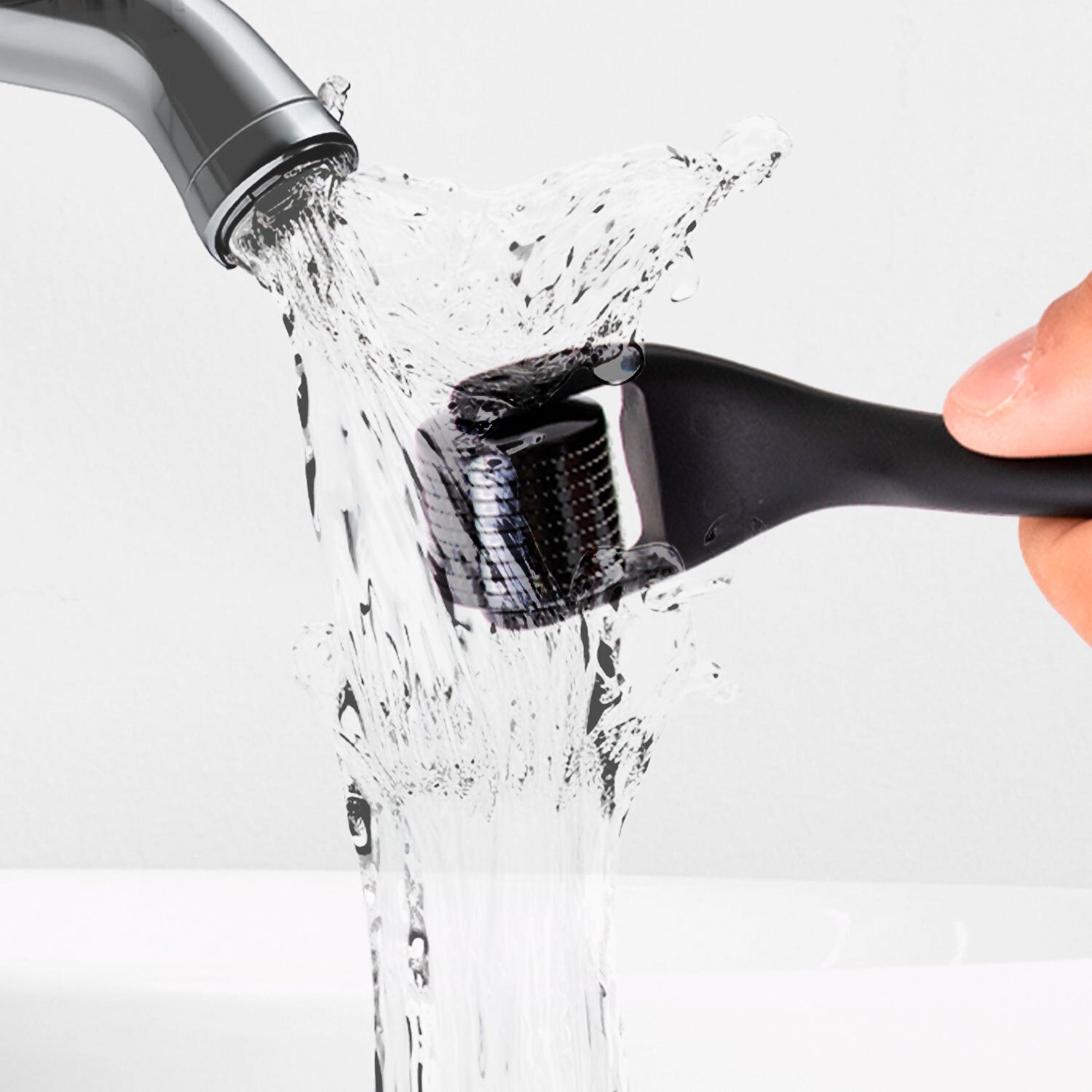 Image of a DermTech Derma Roller being washed with water from a different angle, emphasizing proper cleaning and maintenance for effective hair and skincare routines.